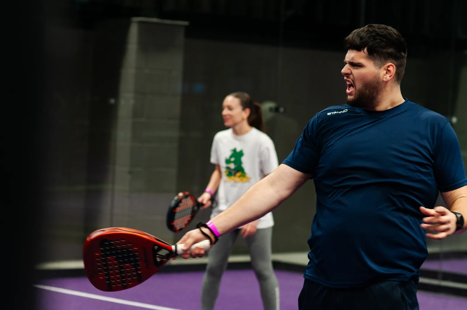 Player mid-celebration during a Shot4Shot Padel event