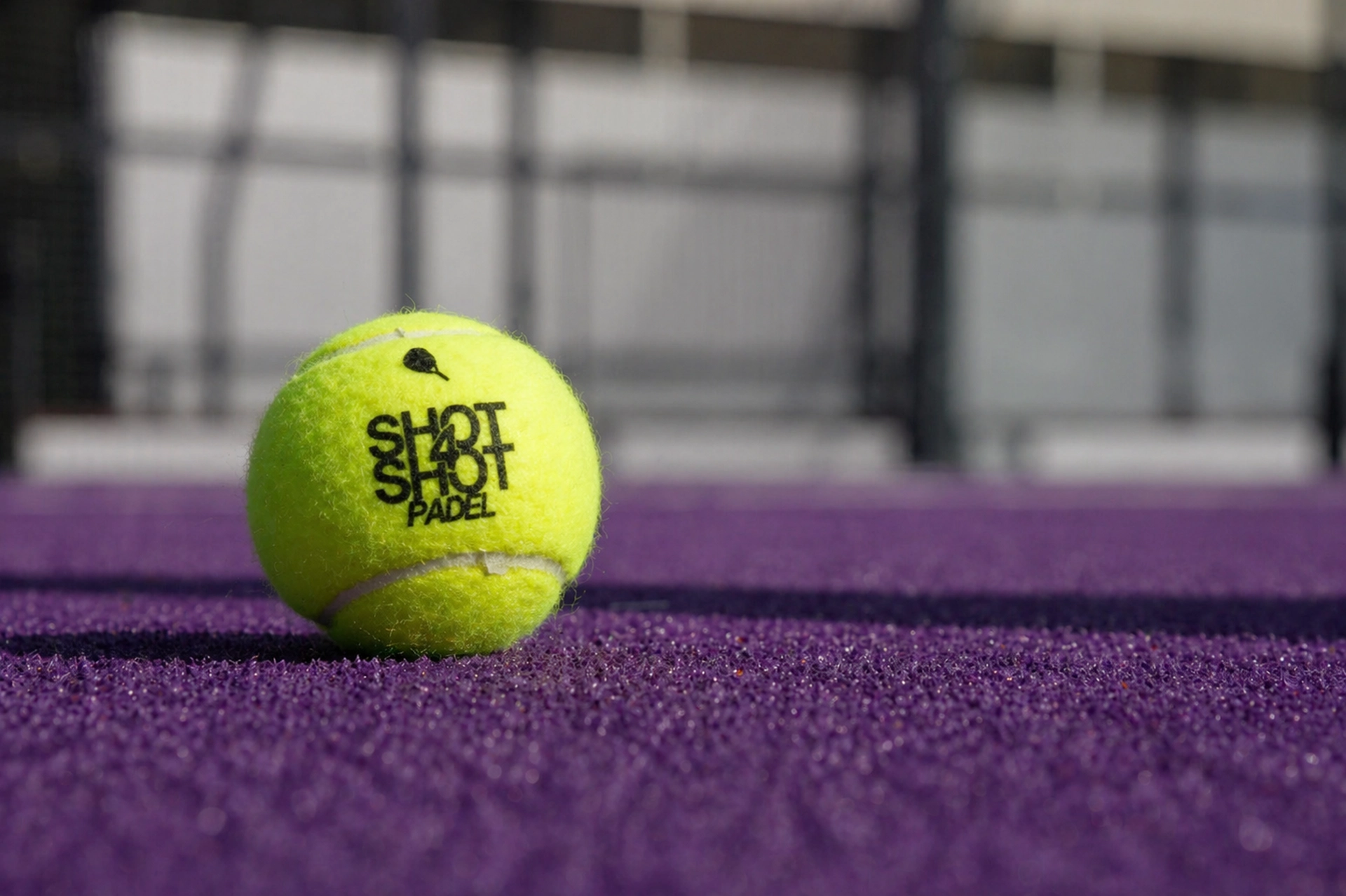 Shot4Shot Padel branded ball on purple court